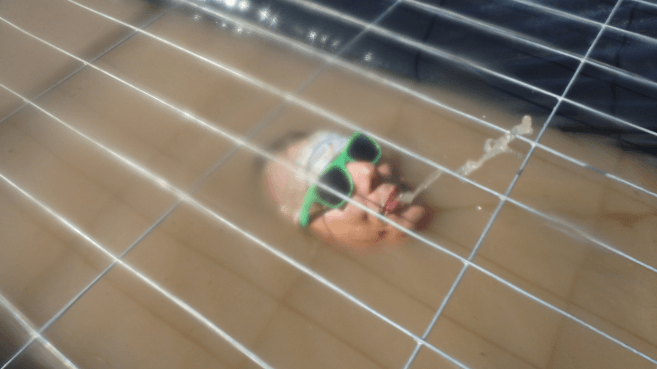 Karriereblog-AKQUINET Beitrag: Ricardo Stier von der unter Wasser bei den Mud Masters 2023